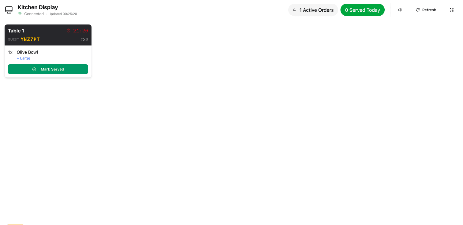 AtTable Kitchen Display System showing live orders with table numbers, items, and timing
