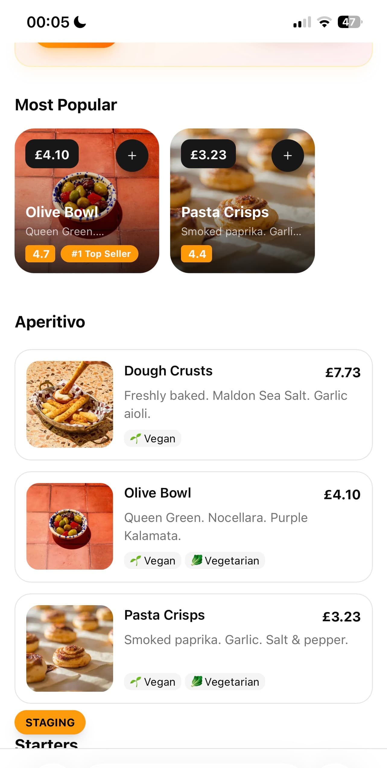 A guest phone showing dishes with prices, tags and a most-popular row